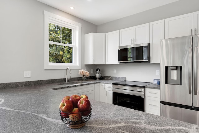 14 Depot St, Buxton, ME 04093 - kitchen featuring appliances with stainless steel finishes, a sink, white cabinets, and recessed lighting