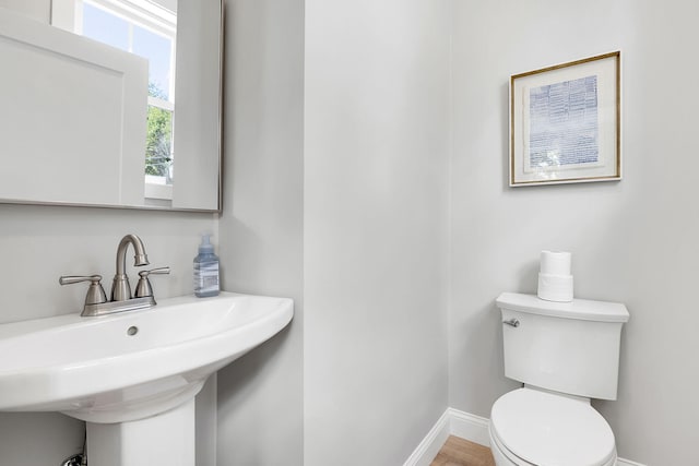 14 Depot St, Buxton, ME 04093 - half bath featuring toilet, a sink, and baseboards