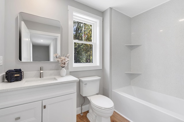 14 Depot St, Buxton, ME 04093 - full bathroom with toilet, wood finished floors, vanity, and bathing tub / shower combination