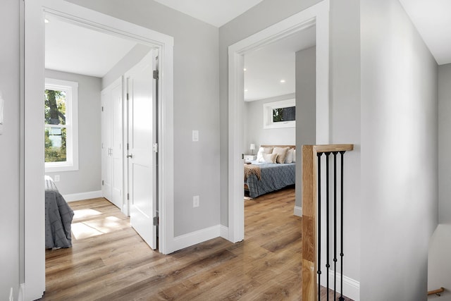 14 Depot St, Buxton, ME 04093 - hallway with wood finished floors, baseboards, and recessed lighting