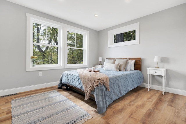 14 Depot St, Buxton, ME 04093 - bedroom with baseboards, light wood-style floors, and recessed lighting