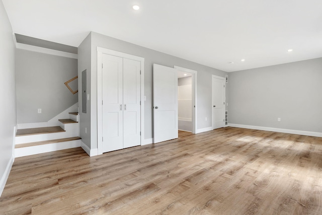 14 Depot St, Buxton, ME 04093 - below grade area featuring baseboards, light wood finished floors, recessed lighting, and stairs