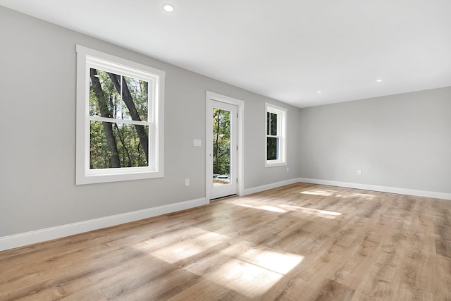14 Depot St, Buxton, ME 04093 - empty room with baseboards, light wood-style floors, and recessed lighting