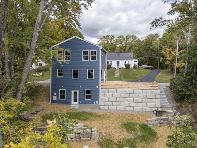14 Depot St, Buxton, ME 04093 - rear view of property featuring a lawn