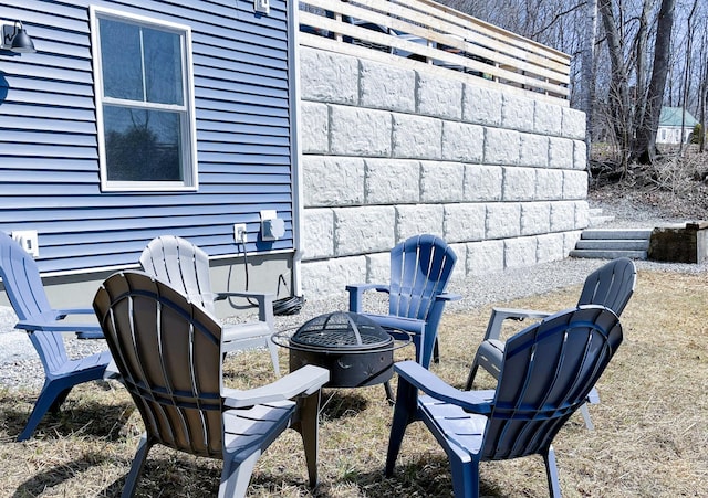 14 Depot St, Buxton, ME 04093 - view of patio / terrace featuring a fire pit