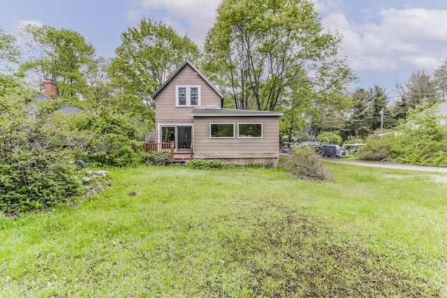 151 Central Ave, Portland, ME 04108 - back of property featuring a wooden deck and a yard