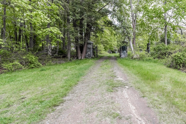 151 Central Ave, Portland, ME 04108 - view of dirt / gravel driveway with a wooded view