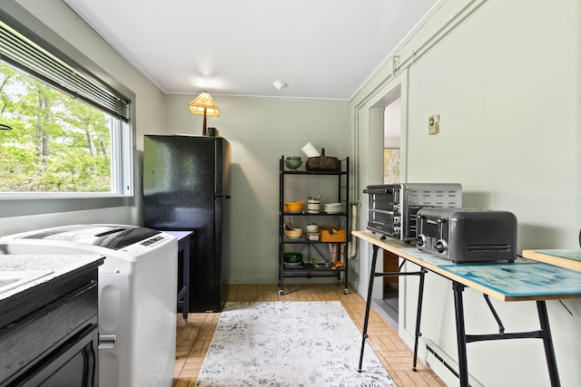 151 Central Ave, Portland, ME 04108 - kitchen with washer / clothes dryer and freestanding refrigerator