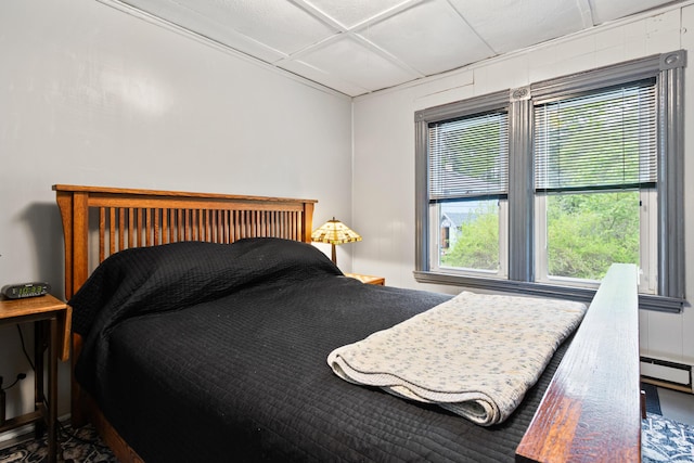 151 Central Ave, Portland, ME 04108 - bedroom with multiple windows and a baseboard heating unit
