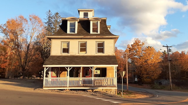 3 Center Hill Rd, Weld, ME 04285 - victorian home featuring covered porch, roof with shingles, and mansard roof