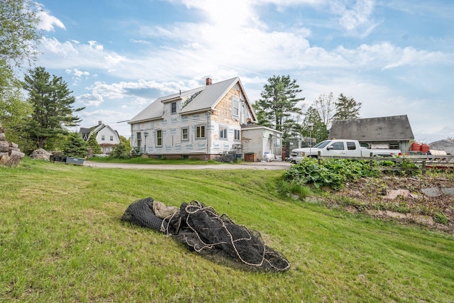 1905 Congress St, Portland, ME 04102 - view of property exterior featuring a yard and metal roof