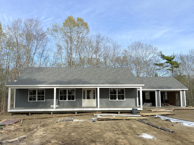 13 Morgan Ln, Limington, ME 04049 - view of front of house featuring covered porch and a shingled roof