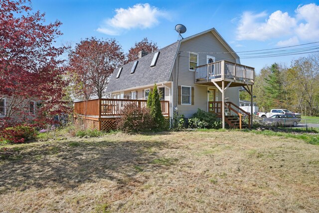 658 High St, West Gardiner, ME 04345 - rear view of property featuring a gambrel roof, a deck, and roof with shingles