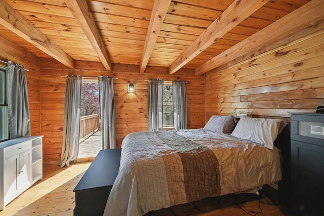 658 High St, West Gardiner, ME 04345 - bedroom featuring beamed ceiling, access to outside, wooden ceiling, wooden walls, and light wood-type flooring