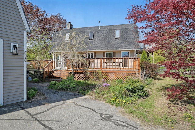 658 High St, West Gardiner, ME 04345 - rear view of property with roof with shingles, a chimney, a deck, and a gambrel roof