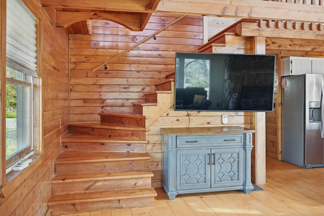 658 High St, West Gardiner, ME 04345 - staircase featuring wooden walls and wood-type flooring