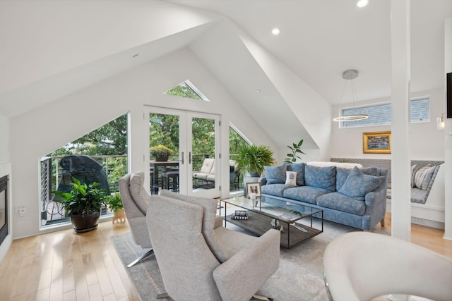 123 Cumberland Ave, Portland, ME 04101 - living area featuring light wood-style floors, vaulted ceiling, recessed lighting, and french doors