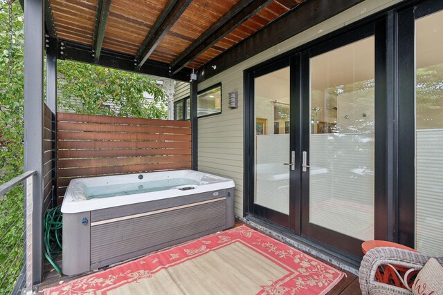 123 Cumberland Ave, Portland, ME 04101 - wooden deck featuring a hot tub and french doors
