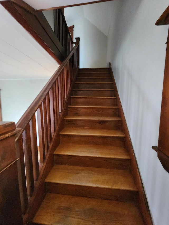 76 Somerset St, Millinocket, ME 04462 - staircase featuring vaulted ceiling