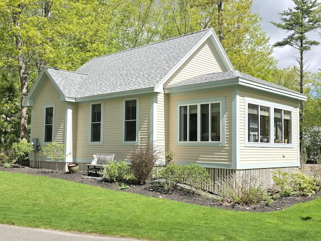 1 Old County Rd Unit 155, Wells, ME 04090 - view of front of home featuring a shingled roof and a front lawn