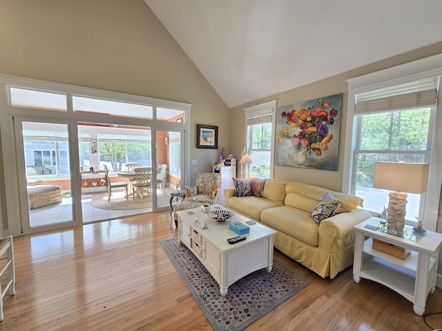1 Old County Rd Unit 155, Wells, ME 04090 - living room with high vaulted ceiling and light wood finished floors