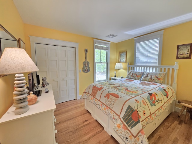 1 Old County Rd Unit 155, Wells, ME 04090 - bedroom with light wood finished floors, a closet, and baseboards