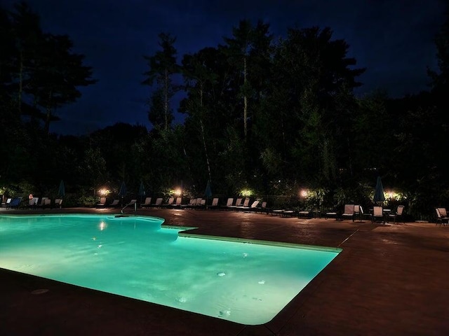 1 Old County Rd Unit 155, Wells, ME 04090 - pool at night with a patio area and a community pool