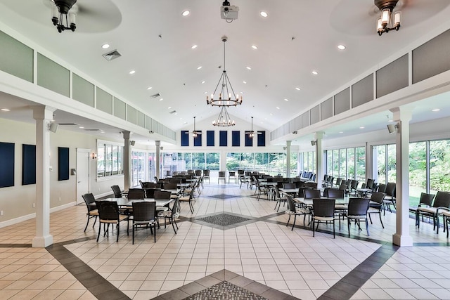 1 Old County Rd Unit 155, Wells, ME 04090 - dining space with ornate columns, tile patterned flooring, inlaid floor details, recessed lighting, and high vaulted ceiling