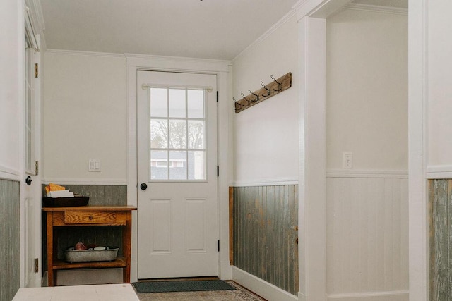 4 St Joseph St, Fort Kent, ME 04743 - entryway featuring wainscoting and ornamental molding
