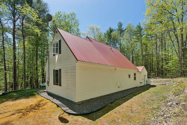 65 Lone Indian Trl, Augusta, ME 04330 - view of side of home with metal roof