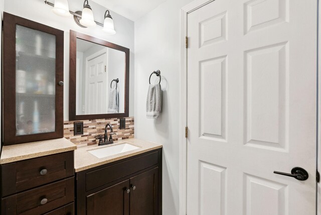 65 Lone Indian Trl, Augusta, ME 04330 - bathroom with backsplash and vanity