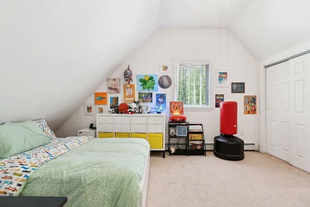 65 Lone Indian Trl, Augusta, ME 04330 - carpeted bedroom with a baseboard heating unit, vaulted ceiling, a baseboard radiator, and a closet