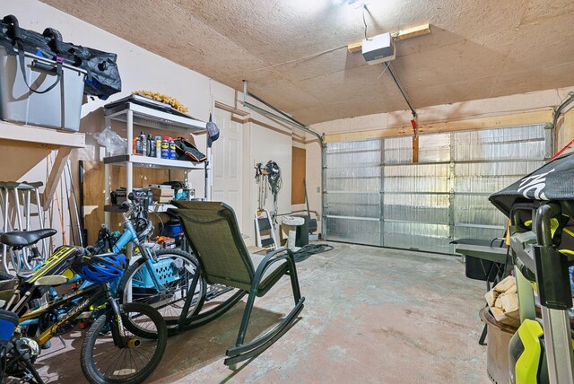 65 Lone Indian Trl, Augusta, ME 04330 - garage with a garage door opener