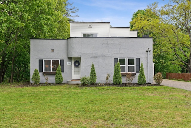 510 Minot Ave, Auburn, ME 04210 - art deco inspired home featuring stucco siding
