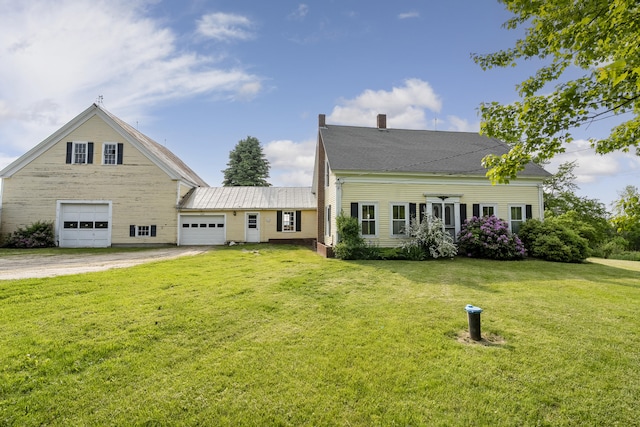 640 Lower St, Turner, ME 04282 - view of front facade featuring dirt driveway, a front yard, and a chimney