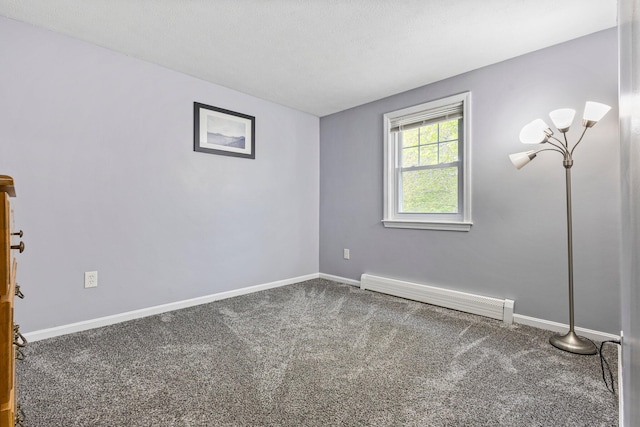 5 Jamestown Ct Unit 5, South Portland, ME 04106 - empty room featuring a baseboard heating unit, carpet floors, and baseboards