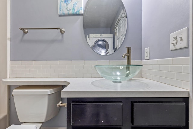 5 Jamestown Ct Unit 5, South Portland, ME 04106 - bathroom with toilet, tasteful backsplash, and vanity