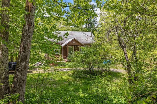 458 Carding Machine Rd, Bowdoinham, ME 04008 - chalet / cabin featuring board and batten siding