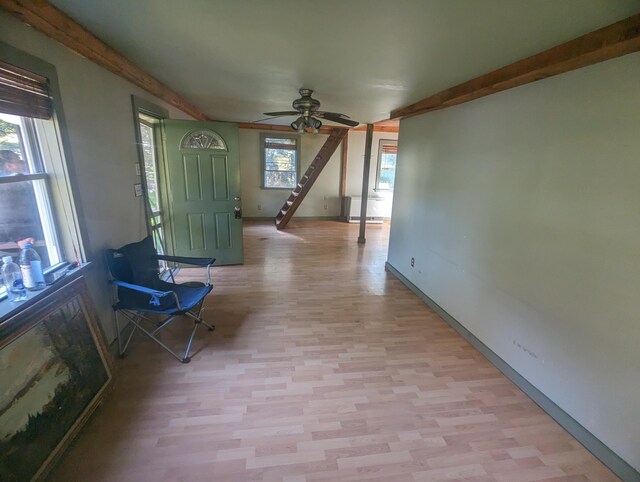 458 Carding Machine Rd, Bowdoinham, ME 04008 - hallway with light wood-type flooring, beamed ceiling, and baseboards