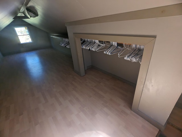 458 Carding Machine Rd, Bowdoinham, ME 04008 - additional living space featuring wood finished floors and vaulted ceiling