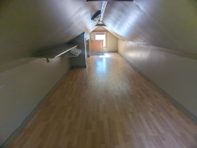 458 Carding Machine Rd, Bowdoinham, ME 04008 - additional living space featuring light wood-style flooring, lofted ceiling, and baseboards