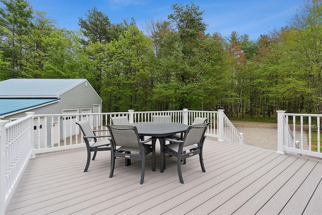 1 Whispering Pines Dr, Old Orchard Beach, ME 04064 - deck with outdoor dining space and an outbuilding