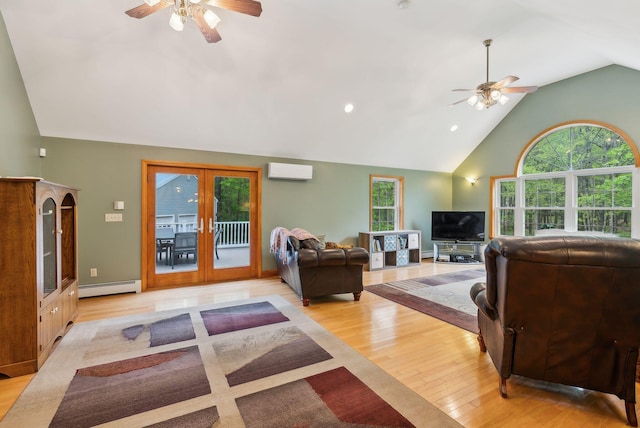 1 Whispering Pines Dr, Old Orchard Beach, ME 04064 - living room featuring ceiling fan, baseboard heating, an AC wall unit, french doors, and high vaulted ceiling