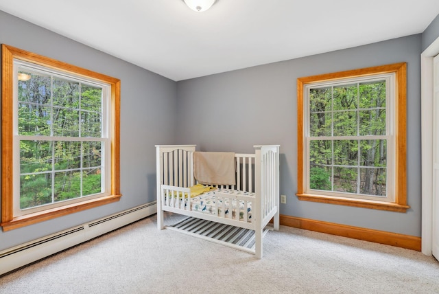 1 Whispering Pines Dr, Old Orchard Beach, ME 04064 - bedroom featuring baseboard heating, multiple windows, and carpet flooring