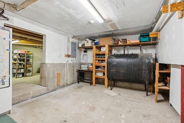 1 Whispering Pines Dr, Old Orchard Beach, ME 04064 - unfinished below grade area featuring oil tank and electric panel