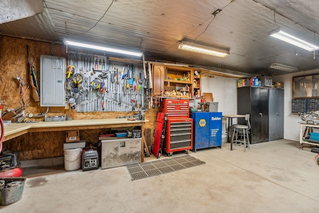 1 Whispering Pines Dr, Old Orchard Beach, ME 04064 - garage with electric panel and a workshop area