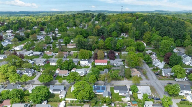 25 Biron Ave, Lewiston, ME 04240 - aerial overview of property's location with a heavily wooded area and nearby suburban area