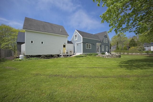 16 Cross St, Camden, ME 04843 - back of property featuring an outdoor fire pit