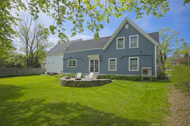 16 Cross St, Camden, ME 04843 - rear view of property featuring an outdoor fire pit, ac unit, and roof with shingles