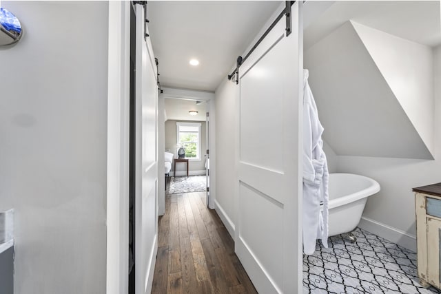 16 Cross St, Camden, ME 04843 - hall with a barn door, baseboards, recessed lighting, and wood finished floors